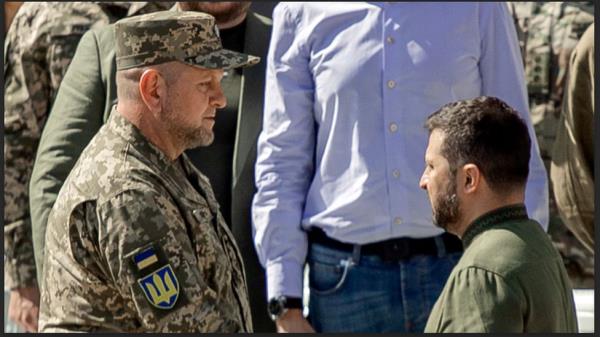 Volodymyr Zelensky (R), President of Ukraine, shakes hands with Valerii Zaluzhnyi (L), Commander-in-Chief of the Armed Forces of Ukraine, during the ceremony celebrating the 32nd anniversary of Ukraine’s independence on Sophia Square on August 24, 2023 in Kyiv, Ukraine.
