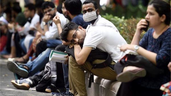 Aspirants outside an examination centre before appearing for the Unio<em></em>n Public Service Commission (UPSC) Civil services prelim examination, at Shahjahan Road on June 5, 2022 in New Delhi, India