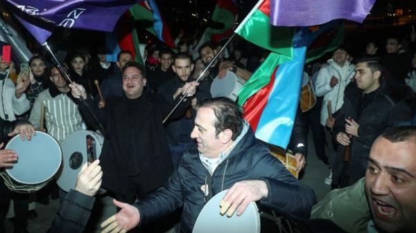 Crowds took to the streets of the capital Baku to celebrate Ilham Aliyev's fifth co<em></em>nsecutive term